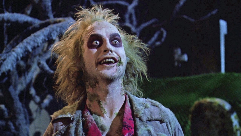Michael Keaton as Beetlejuice in the 1988 Tim Burton film, in full makeup and costume