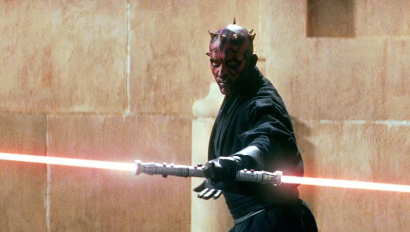 Darth Maul wielding his double-bladed red lightsaber in The Phantom Menace