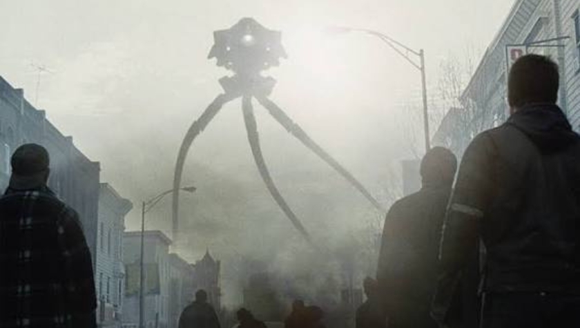 A towering alien tripod machine looms over a foggy street as onlookers watch helplessly in War of the Worlds